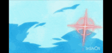 a person is flying through a circle of water with a fireball coming out of the center .
