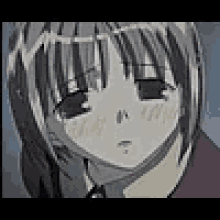 a close up of a cartoon character 's face with a sad look on it .
