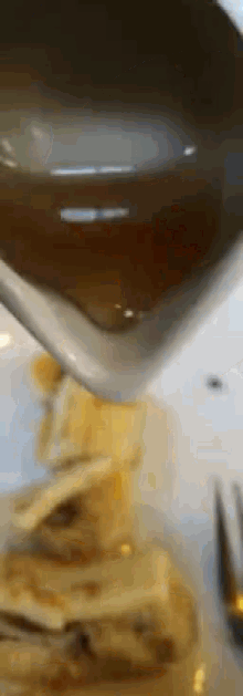 pouring honey breakfast
