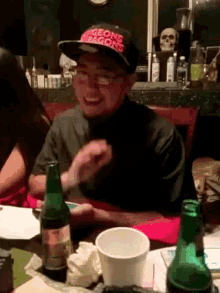a man wearing a hat that says dungeons & dragons