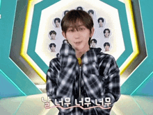 a young man in a plaid shirt is standing in front of a group of people with stickers on them .