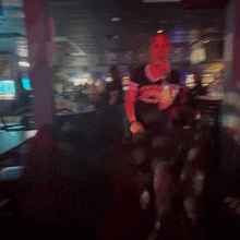a blurry picture of a man wearing a shirt that says eagles