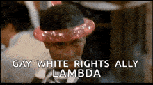 a man wearing a red balloon hat says gay white rights ally lambda