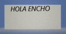a white sign that says hola encho in black letters