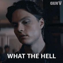 a close up of a man 's face with the words " what the hell " below him