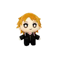 a stuffed toy of a boy with yellow hair and a black jacket