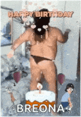 a man in a bikini is standing in front of a birthday cake with a candle .