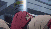 a person in a red glove is touching another person 's arm in front of a building