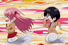 a boy and a girl are playing a game of cards