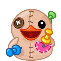 a stuffed duck has a heart pinned to its chest