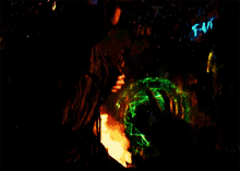 a person playing a violin in a dark room with glowing lights