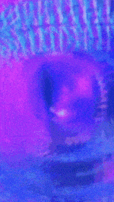 a pink and blue background with a circle in the middle of it