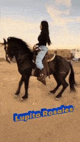 a woman riding a horse in the desert with lupita rosales written on the bottom