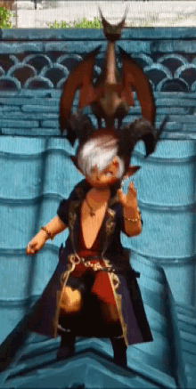 a cartoon character with a dragon on his head is laying down on a blue surface .