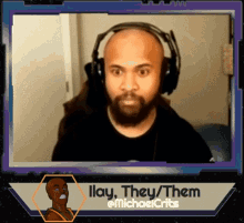 a man wearing headphones with the caption illay they / them @michaelcrits