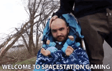Welcome To Spacestation Gaming Big Head Baby In Stroller GIF - Welcome To Spacestation Gaming Big Head Baby In Stroller Spacestation Gg GIFs