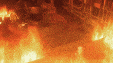 a room with a lot of flames coming out of the walls