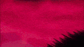 a close up of a pink and black object on a red background