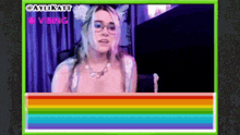 a woman with glasses is sitting in front of a computer screen with a rainbow border and the words aylikatt vibing