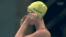 fixing my goggles emma mckeon australia swimming team nbc olympics getting ready