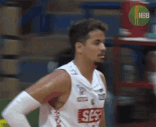 a basketball player wearing a shirt that says ' ses ' on it
