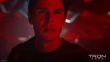 a close up of a man 's face with the words tron ares on the bottom