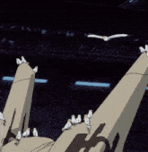 a flock of birds are perched on the tail of an airplane with the letter h on the tail