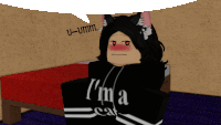 a girl with cat ears is wearing a black hoodie that says i 'm a cat