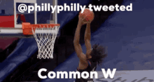 a basketball player is jumping in the air to dunk a ball