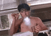 Corey Feldman Smoking Cigarettes GIF - Corey Feldman Smoking Cigarettes Evil Obsession GIFs