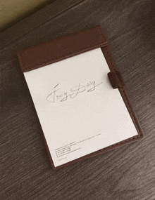 a notepad with the name jony daisy written on it