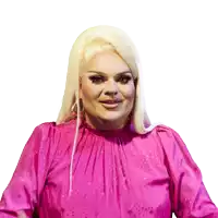 a woman with blonde hair is wearing a pink top with stars on it
