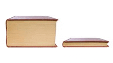 two books are stacked on top of each other on a white background . one of the books is larger than the other .