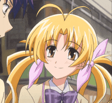 a girl with blonde hair and a purple bow tie looks at the camera