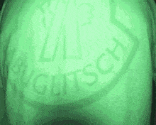 a close up of a green bottle that says busch