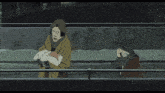 a woman is holding a baby in her arms while another woman watches