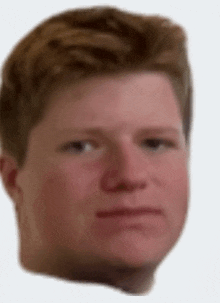 a close up of a man 's face with a serious expression on his face .