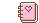 a pink notebook with a heart on it