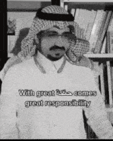 a black and white photo of a man with the words " with great comes great responsibility " on the bottom