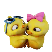 two yellow ducks wearing sunglasses and a pink bow