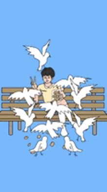a boy sitting on a bench surrounded by birds