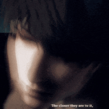 a close up of a person 's face with the words " the closer they are to it " above it