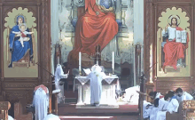 a church with a painting of jesus and mary on the wall