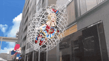 a woman in a superhero costume is trapped in a wire cage