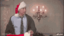 Hammer Chevy Chase GIF - Hammer Chevy Chase Christmas GIFs
