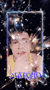 a man in a yellow tank top with the name maldho on the bottom