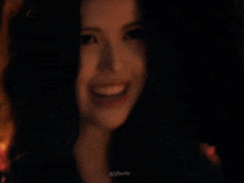 a close up of a woman 's face with the words njfuerie below her