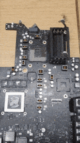 a computer motherboard with a cpu socket and a ram socket