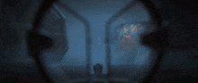 a blurred image of a person standing in a room