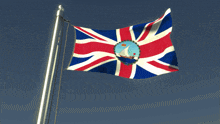 a british flag with a sailboat in the middle